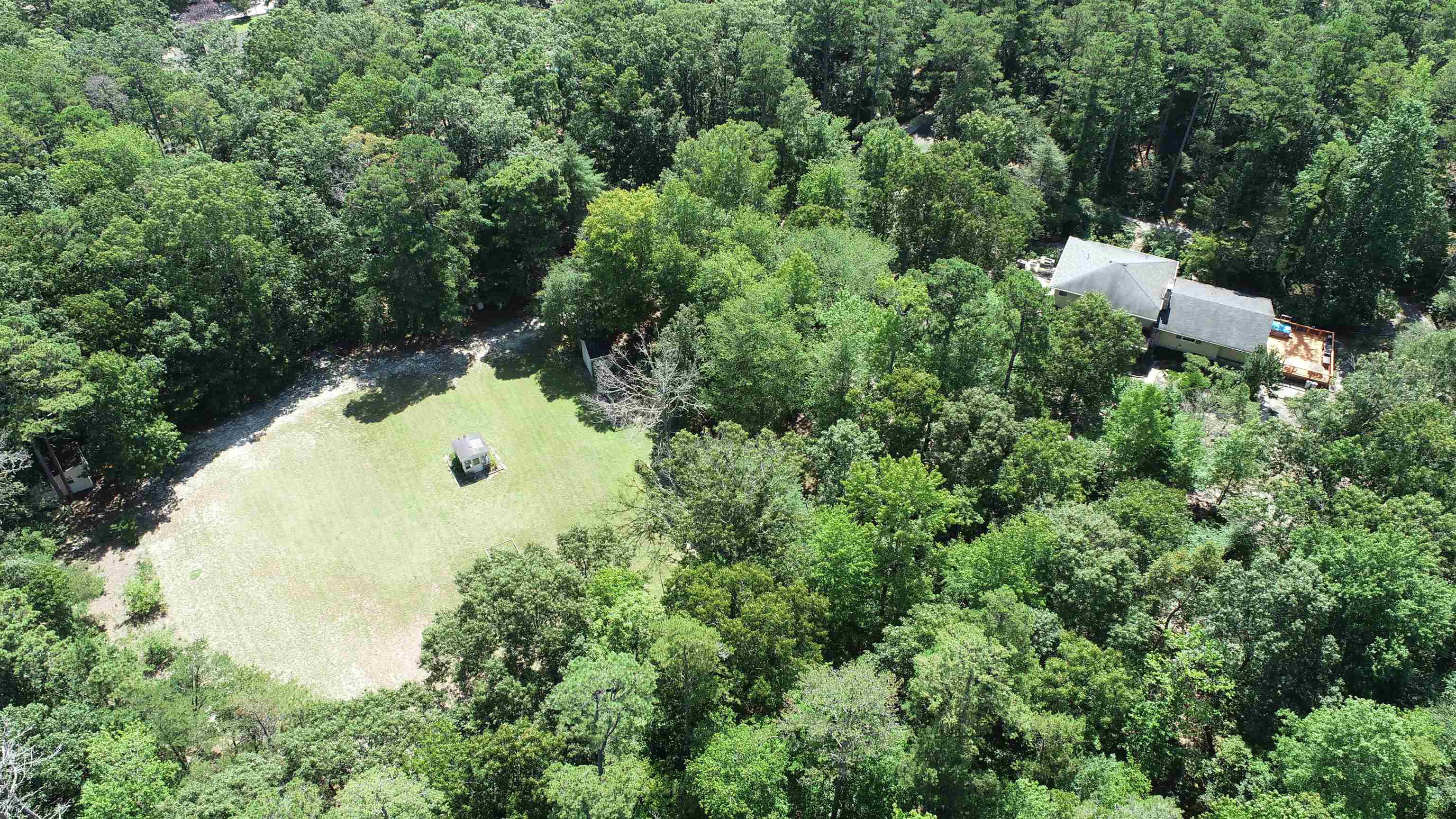 506 Hagen Road South Dennis, NJ 08210 - Photo 5 of 49 an aerial view of a house with yard and outdoor seating