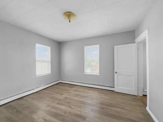 an empty room with windows