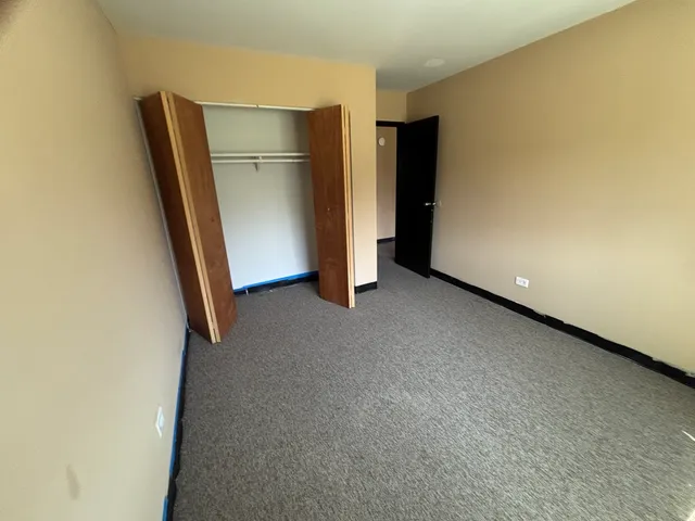 an empty room with closet