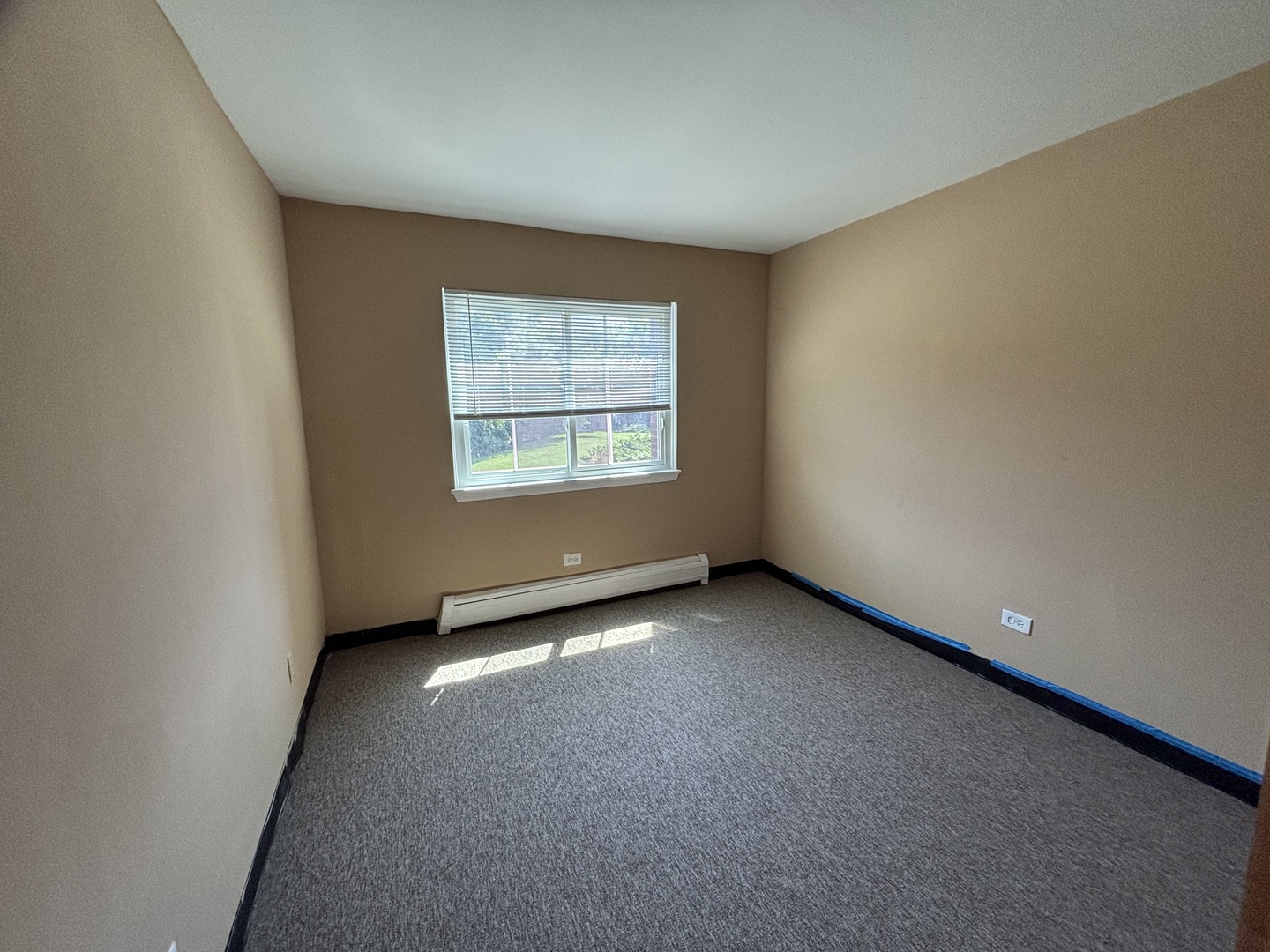 701 Spruce Court, Unit 4 Vernon Hills, IL 60061 - Photo 15 of 18 an empty room with a window