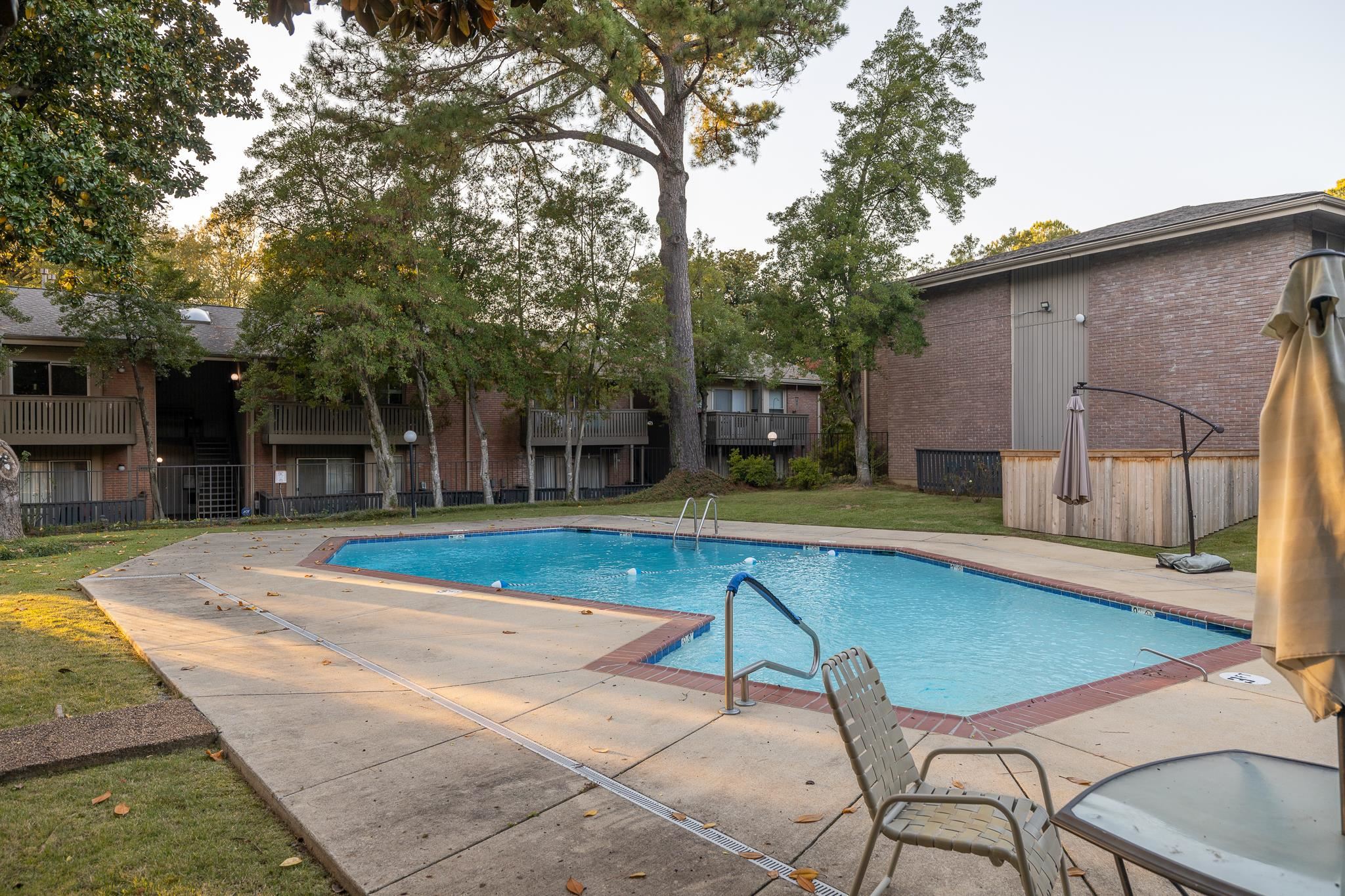 726 Hedgegrove Drive, Unit 3 Memphis, TN 38117 - Photo 20 of 30 a view of a house with swimming pool and sitting area
