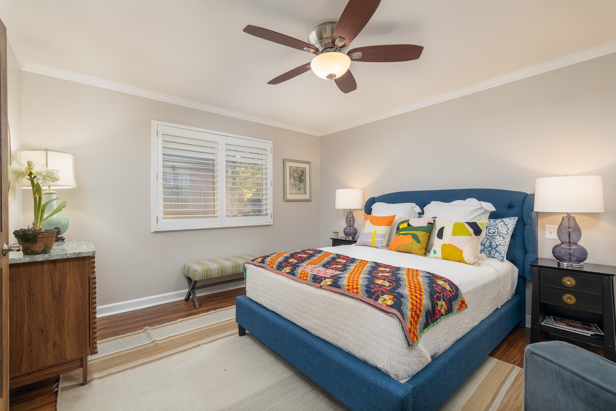 726 Hedgegrove Drive, Unit 3 Memphis, TN 38117 - Photo 10 of 30 a bedroom with a bed and a chandelier