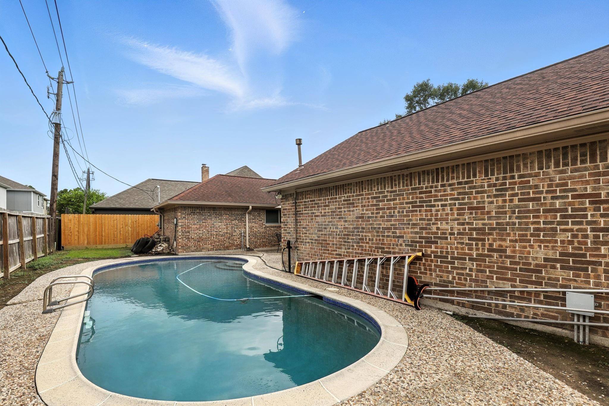 2910 Riata Lane Houston, TX 77080 - Photo 21 of 23 a view of a house with a patio
