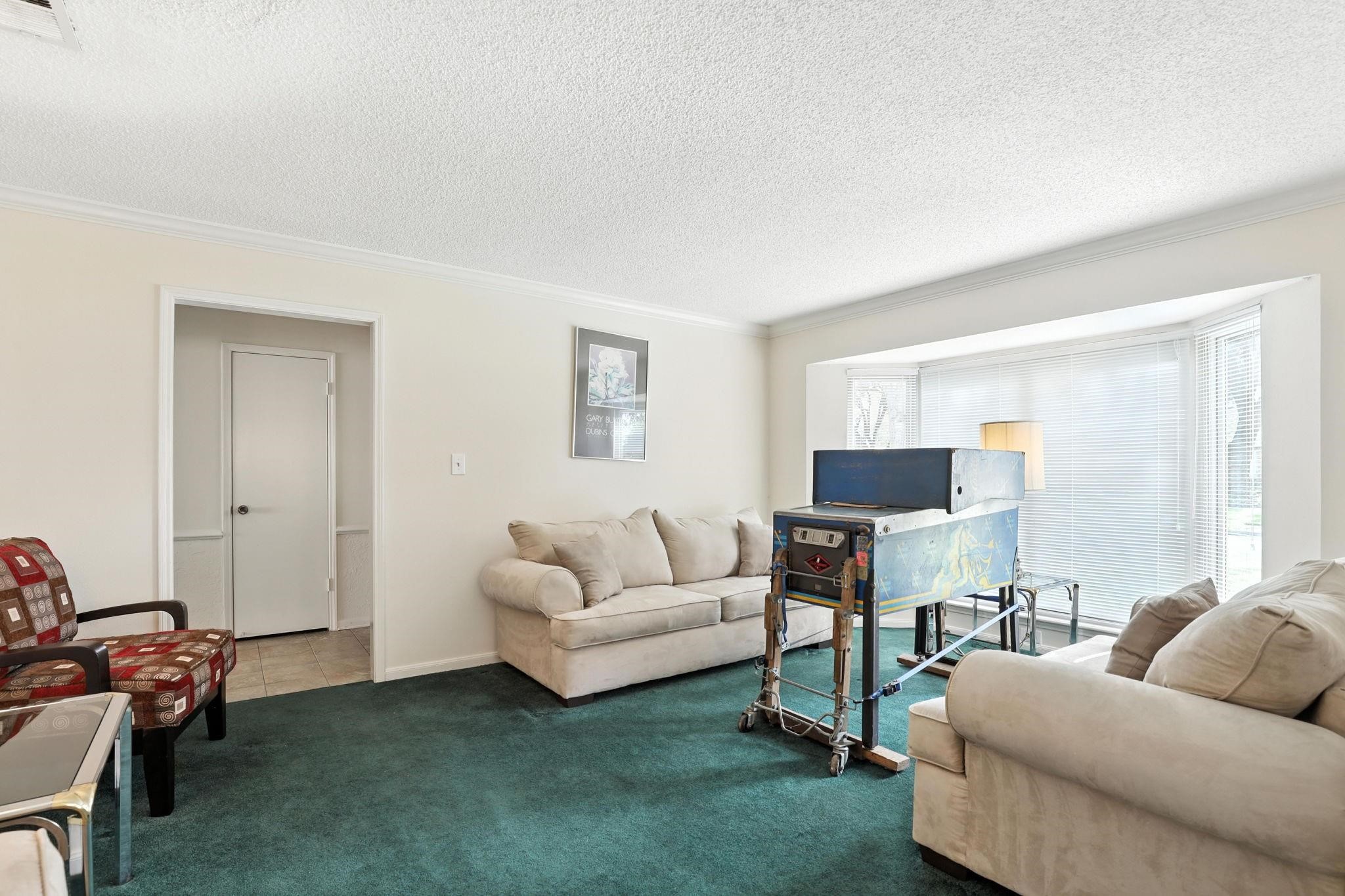 2910 Riata Lane Houston, TX 77080 - Photo 5 of 23 a living room with furniture and a wooden floor