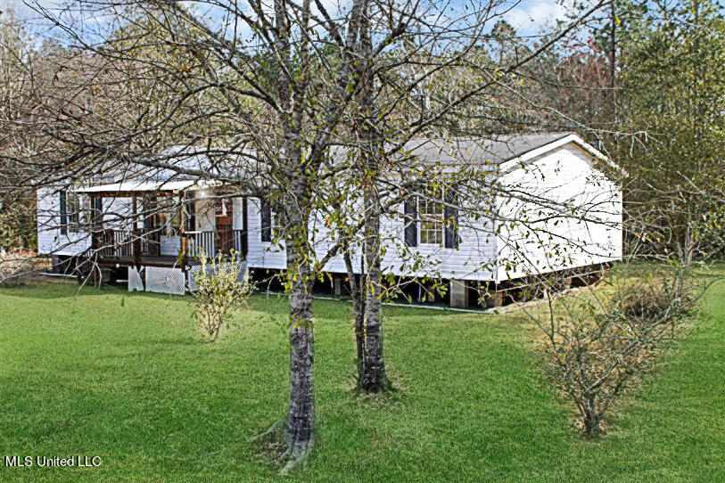 26120 Quail Ridge Circle Perkinston, MS 39573 - Photo 3 of 16 IMG_1174