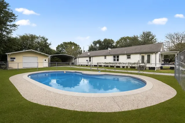 a view of outdoor space yard swimming pool and patio