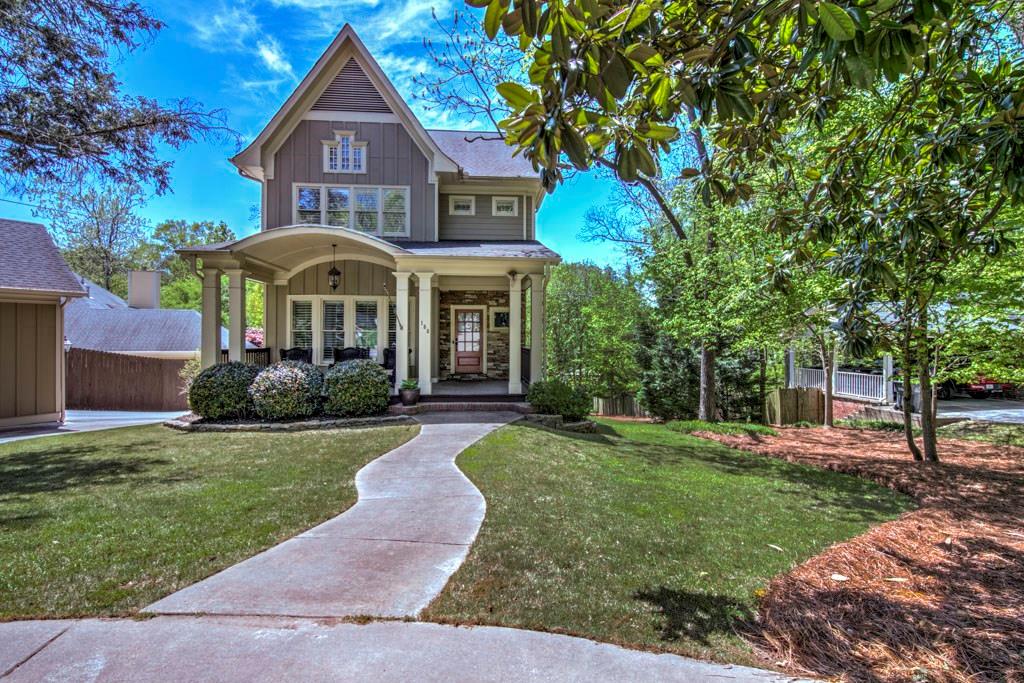 155 Holcomb Bridge Road Norcross, GA 30071 - Photo 1 of 1 a front view of a house with a yard