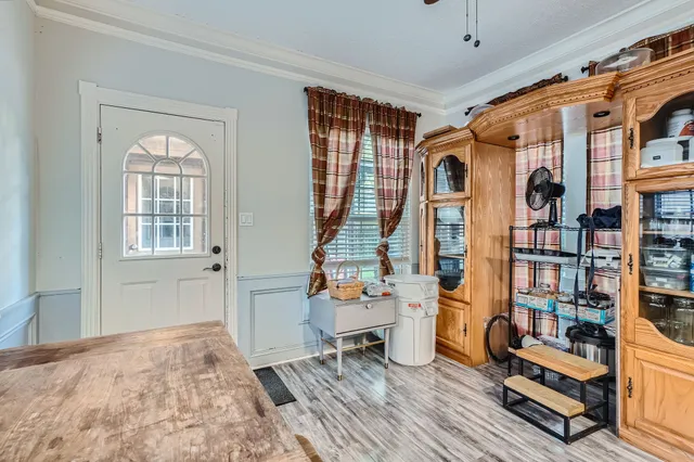 a room with furniture and gym equipment