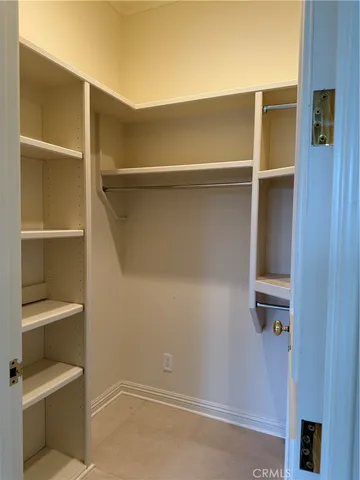 a view of an empty walk in closet
