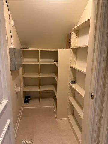 a view of an empty walk in closet