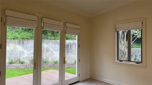 a view of an empty room and window