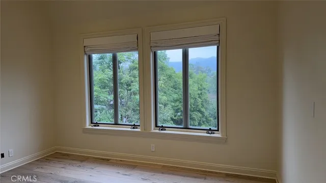 a view of a room that has a window