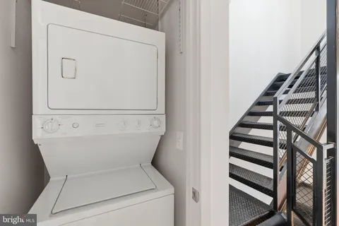 a utility room with washer and dryer