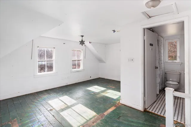 a view of livingroom with hardwood floor and hallway