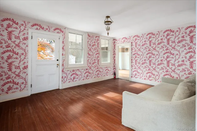 a view of livingroom with furniture and window