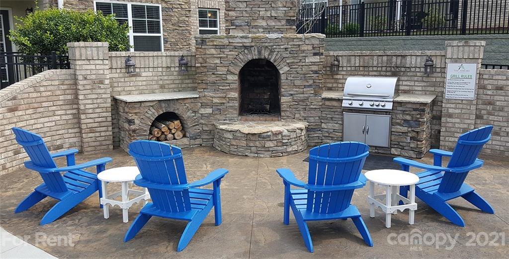 920 Stockbridge Drive Fort Mill, SC 29708 - Photo 12 of 20 a view of a table and chairs in the patio