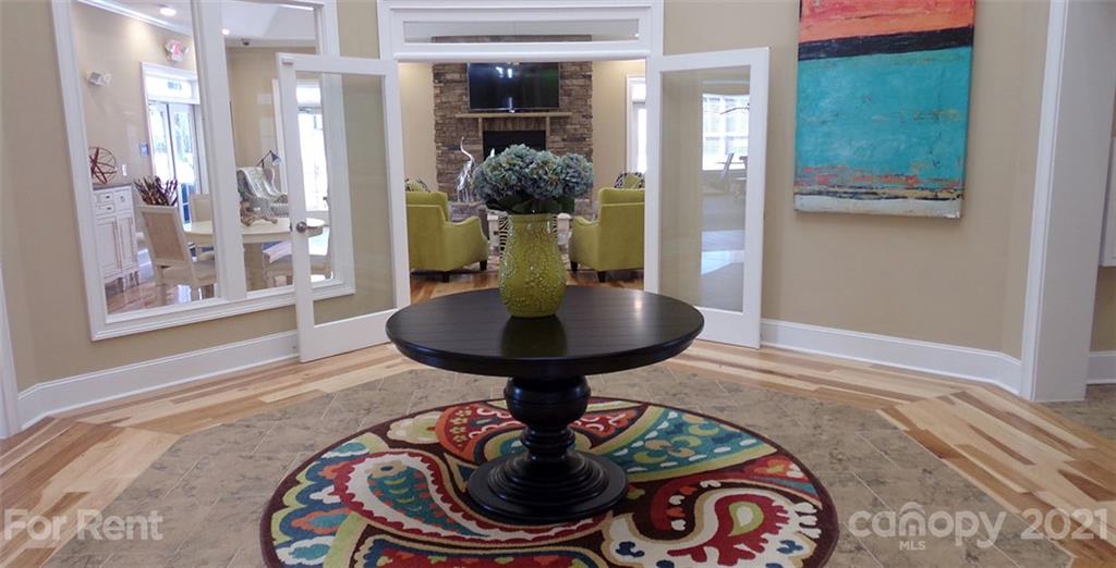 920 Stockbridge Drive Fort Mill, SC 29708 - Photo 4 of 20 a room with furniture and a chandelier