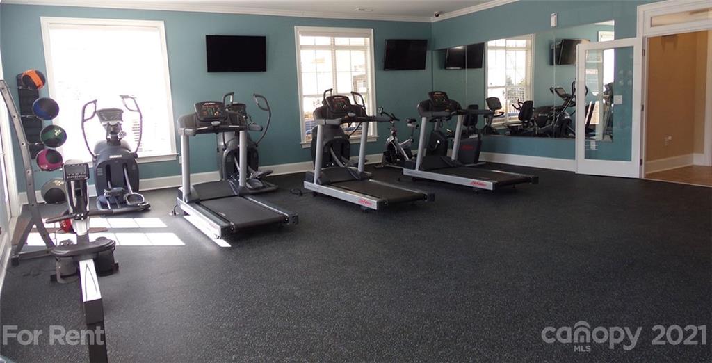 920 Stockbridge Drive Fort Mill, SC 29708 - Photo 8 of 20 a view of a room with gym equipment