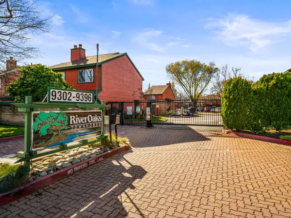 a view of a street with houses
