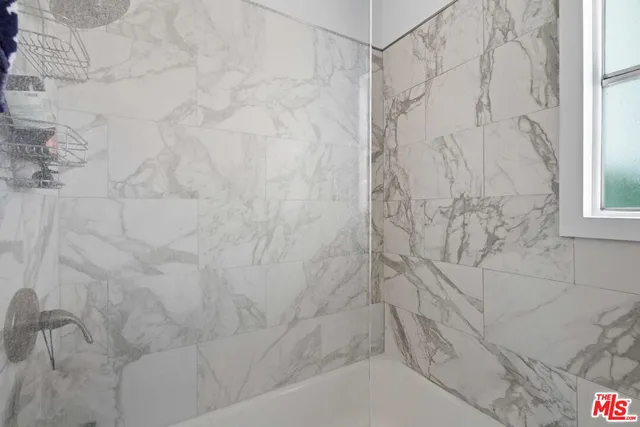 a bathroom with a toilet sink and bathtub