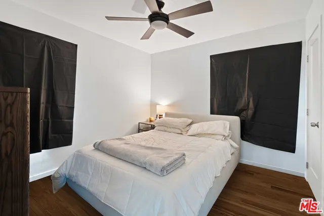 a view of bedroom with hardwood floor