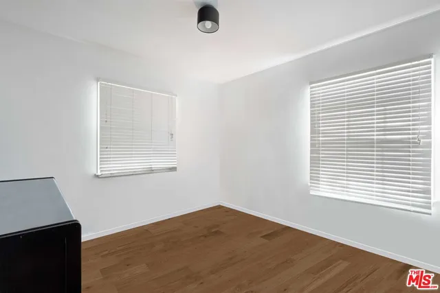 a view of a room with toys and a window