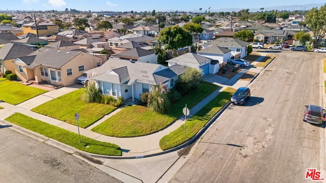 an aerial view of residential house with outdoor space