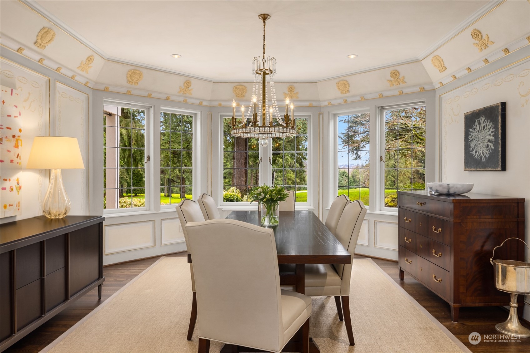 2045 Parkside Drive East Seattle, WA 98112 - Photo 12 of 38 a view of a dining room with furniture large windows and wooden floor
