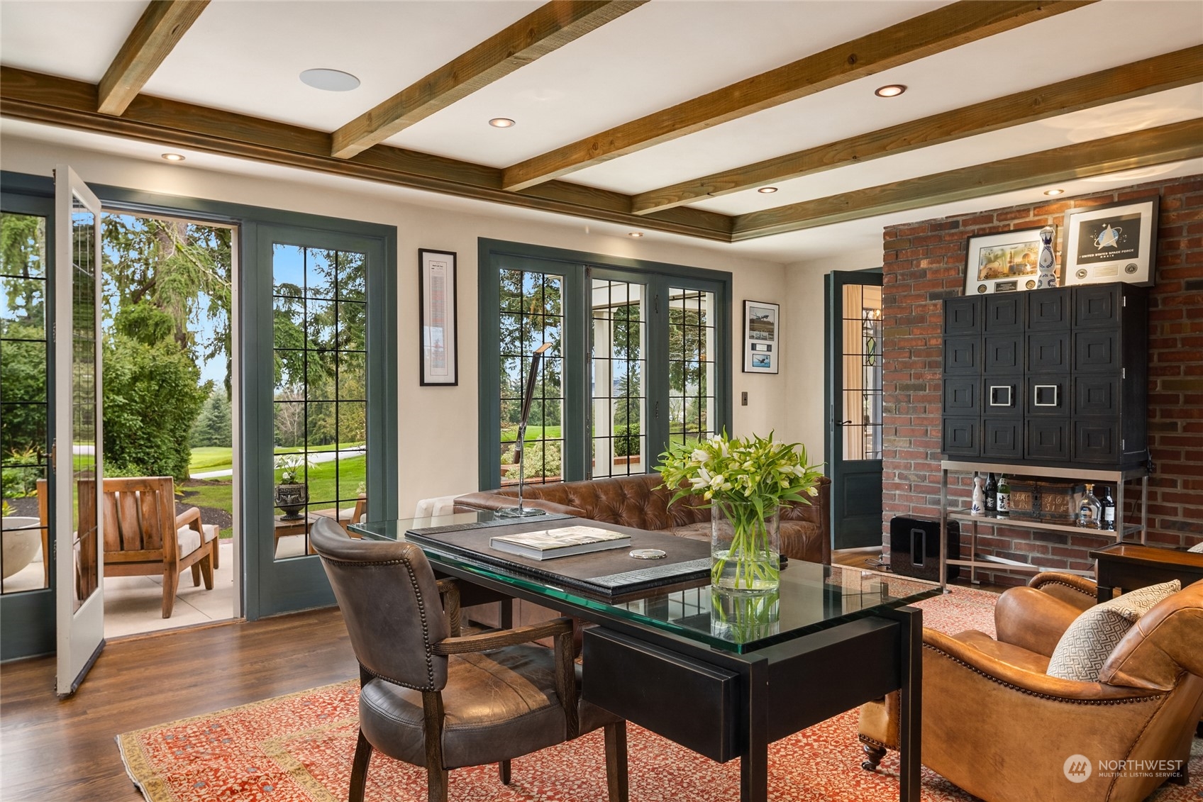 2045 Parkside Drive East Seattle, WA 98112 - Photo 19 of 38 a view of a dining room with furniture large windows and wooden floor