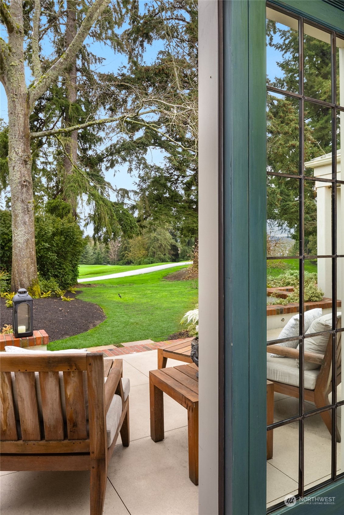 2045 Parkside Drive East Seattle, WA 98112 - Photo 20 of 38 a view of a porch with furniture and garden
