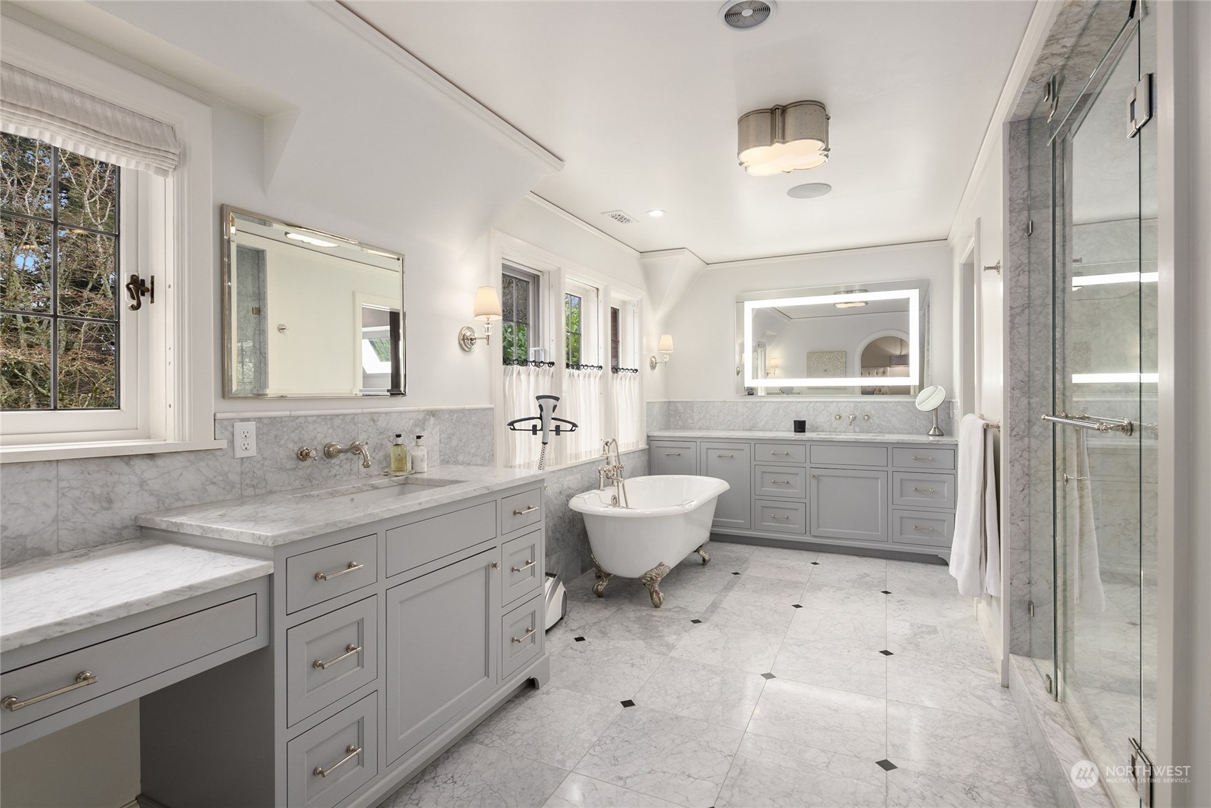 2045 Parkside Drive East Seattle, WA 98112 - Photo 26 of 38 a bathroom with a sink a toilet and shower