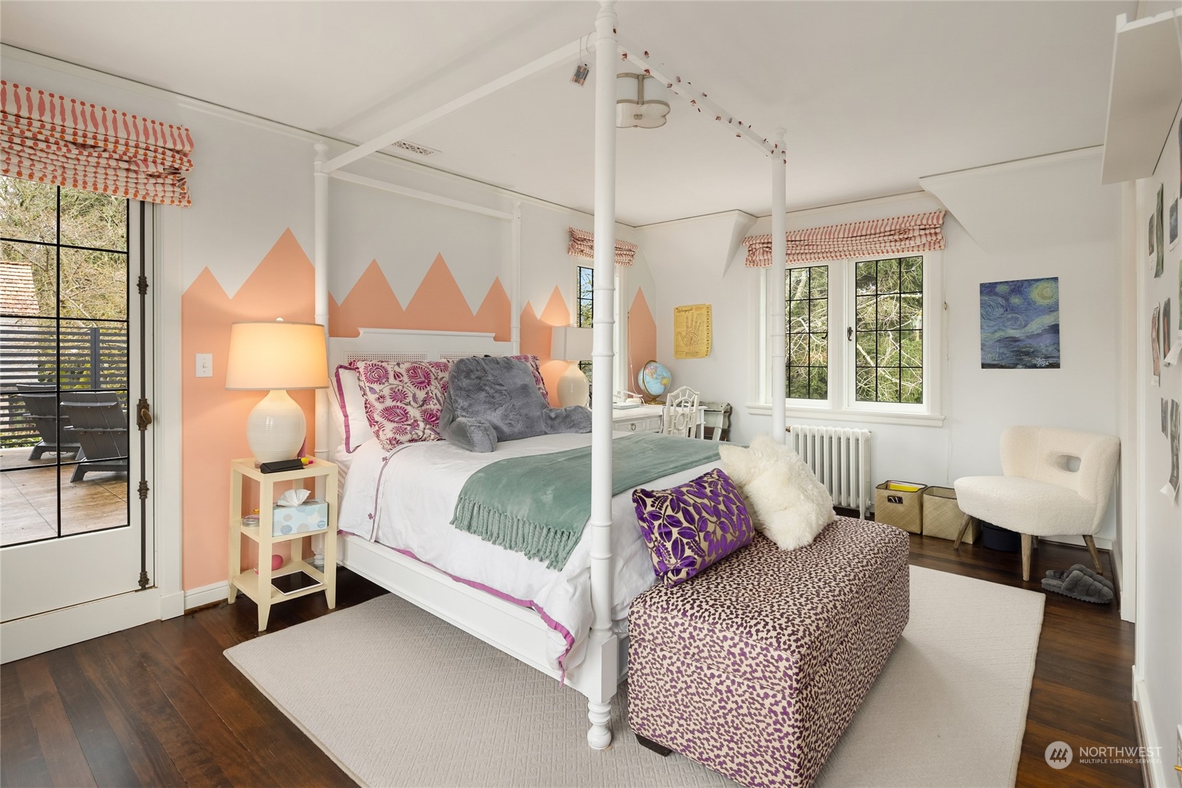 2045 Parkside Drive East Seattle, WA 98112 - Photo 28 of 38 a bedroom with a bed and wooden floor