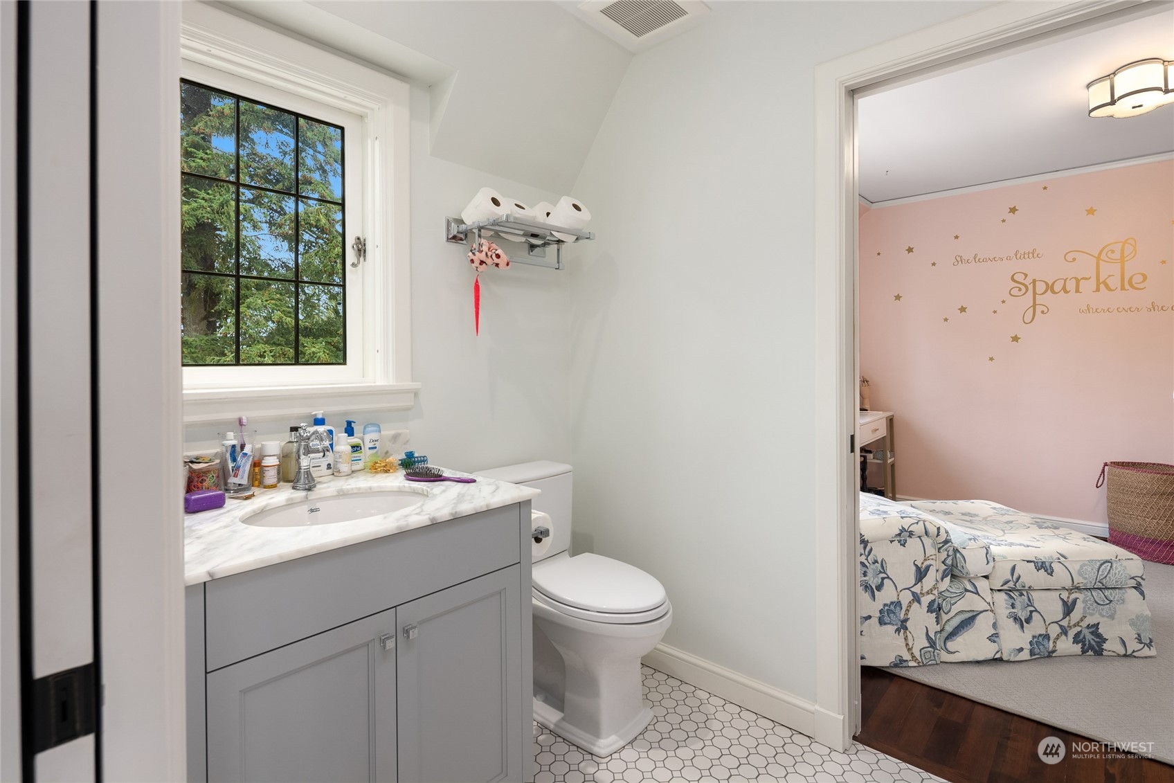 2045 Parkside Drive East Seattle, WA 98112 - Photo 29 of 38 a bathroom with a sink toilet and mirror