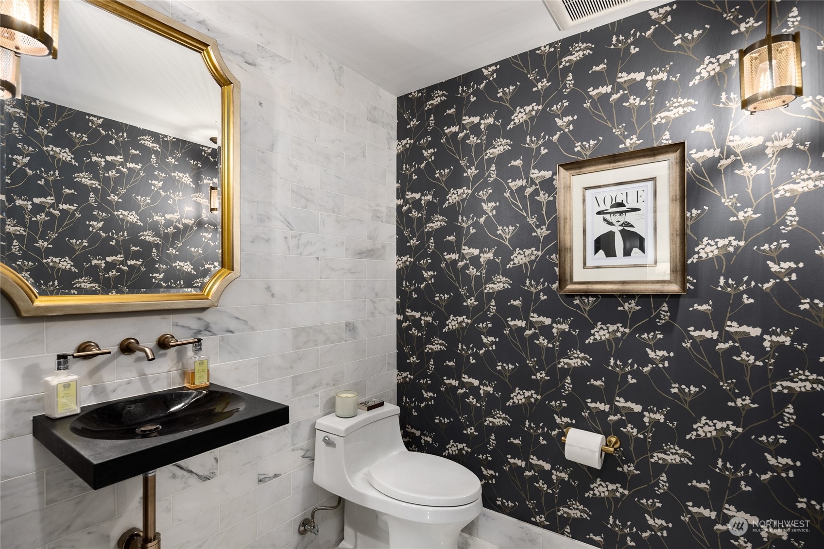2045 Parkside Drive East Seattle, WA 98112 - Photo 37 of 38 a bathroom with a toilet a sink and a mirror