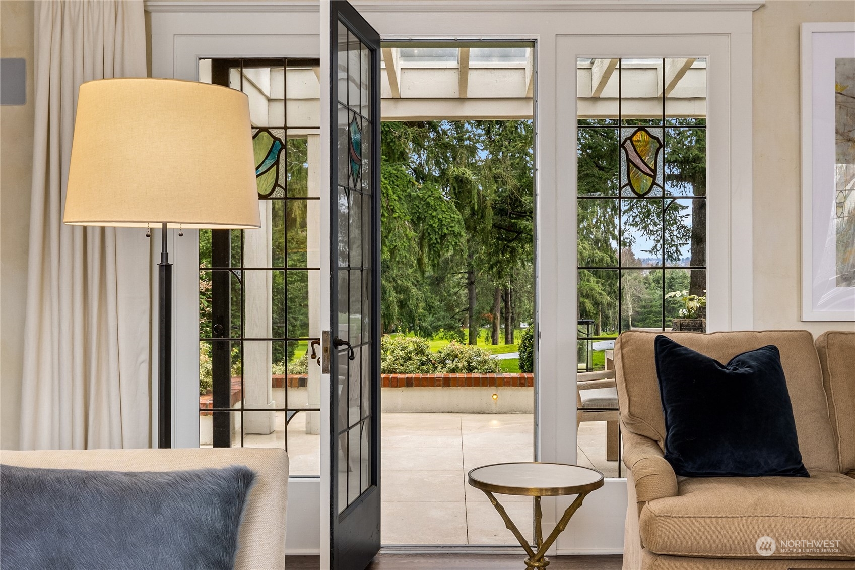 2045 Parkside Drive East Seattle, WA 98112 - Photo 10 of 38 a living room filled with furniture and a large window