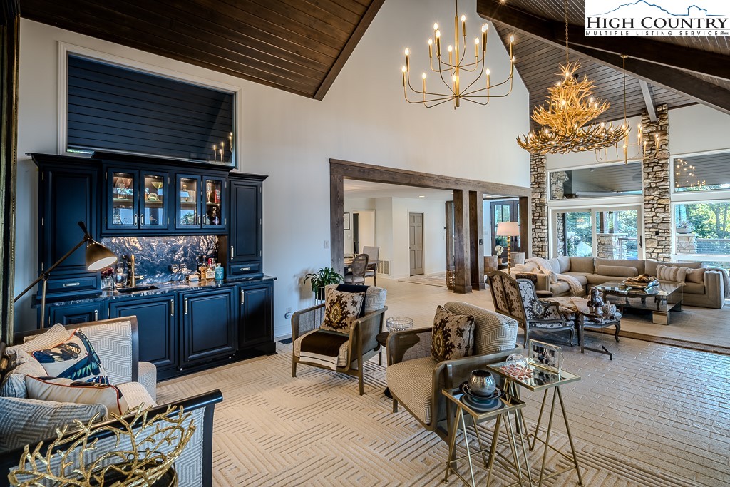804 Crest Trail Linville, NC 28646 - Photo 12 of 40 a living room with furniture and wooden floor