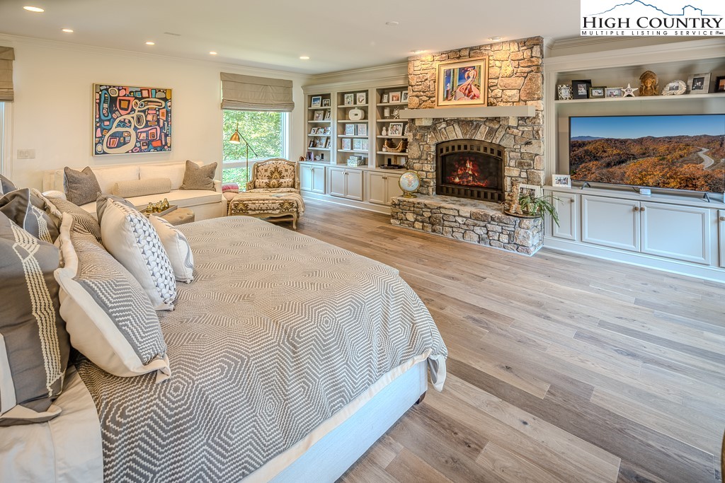 804 Crest Trail Linville, NC 28646 - Photo 17 of 40 a living room with furniture and a fireplace