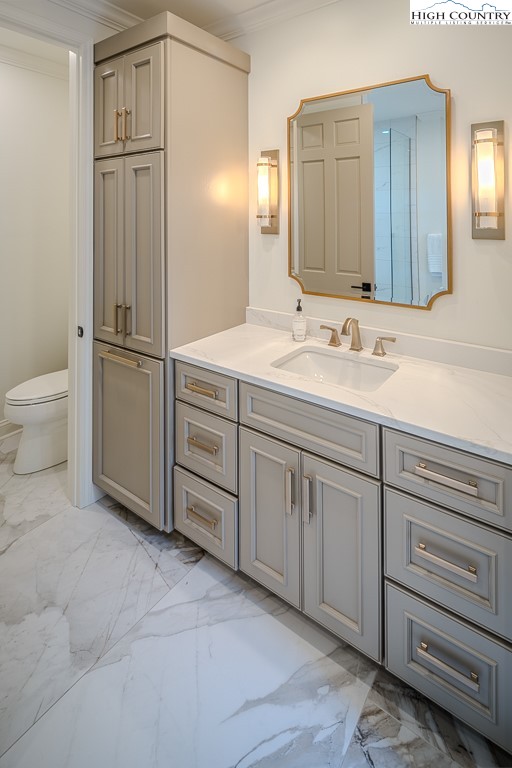 804 Crest Trail Linville, NC 28646 - Photo 19 of 40 a bathroom with a double vanity sink and mirror