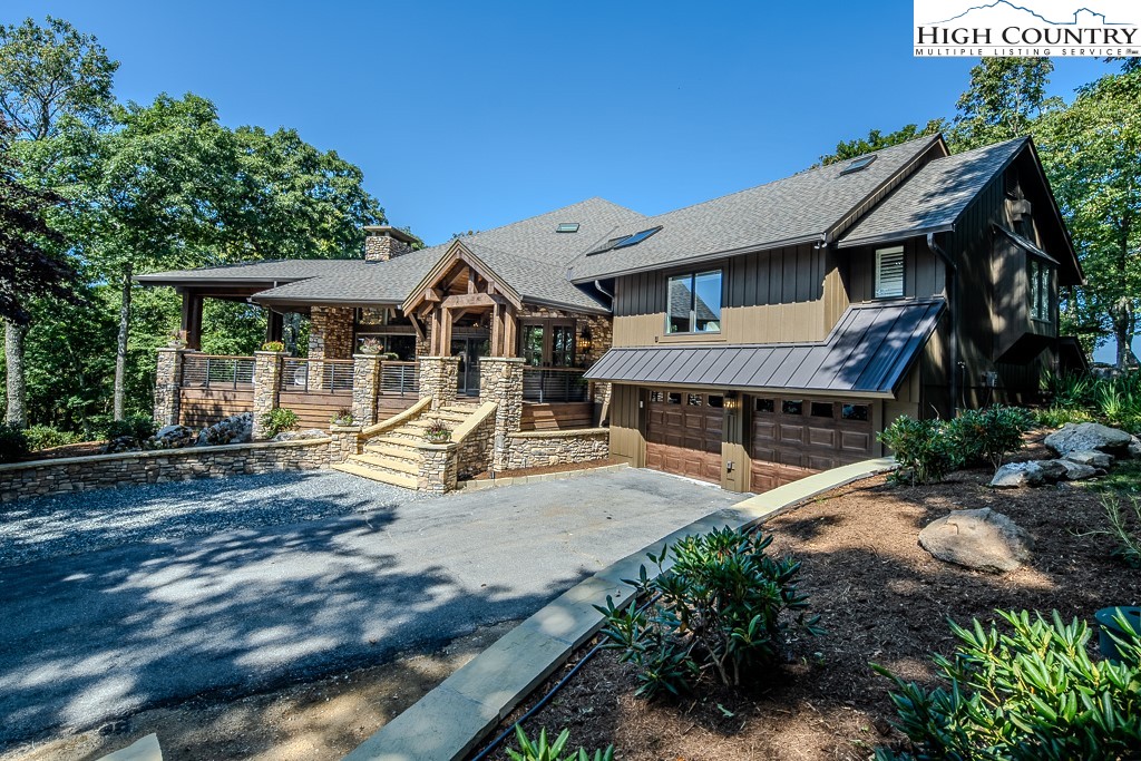 804 Crest Trail Linville, NC 28646 - Photo 2 of 40 a view of a house with backyard and sitting area