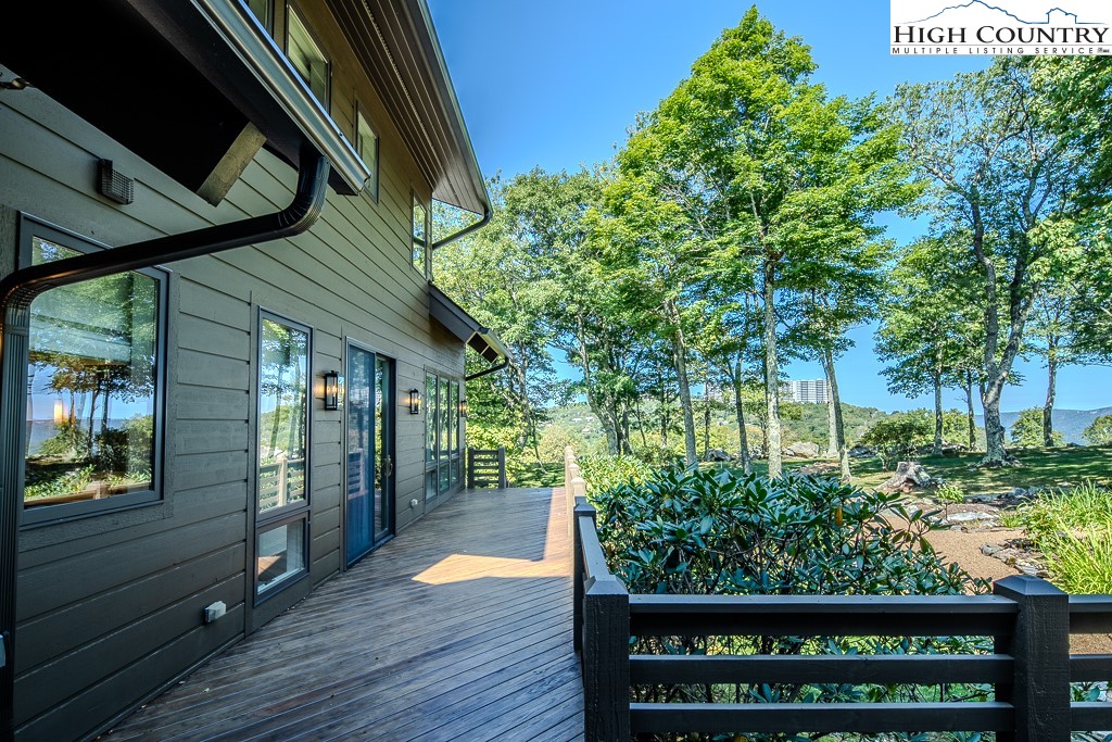 804 Crest Trail Linville, NC 28646 - Photo 38 of 40 a view of a porch with a bench