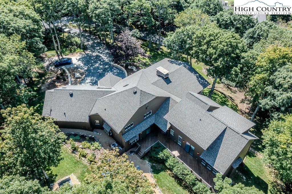 804 Crest Trail Linville, NC 28646 - Photo 39 of 40 an aerial view of a house with a yard