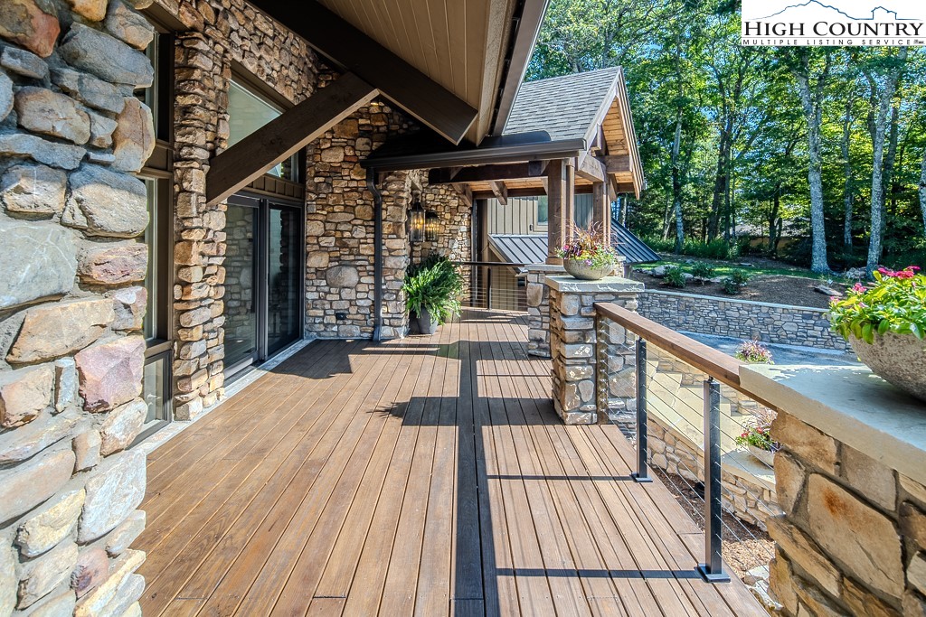804 Crest Trail Linville, NC 28646 - Photo 4 of 40 a view of balcony with wooden floor and seating space