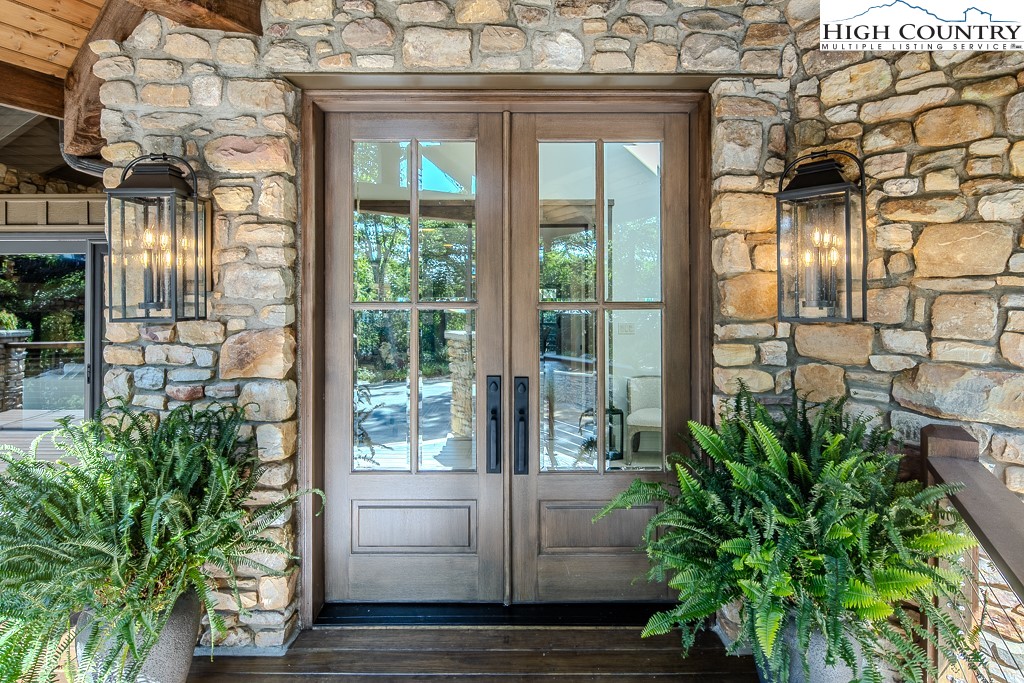 804 Crest Trail Linville, NC 28646 - Photo 5 of 40 a view of a door of the house with a fountain