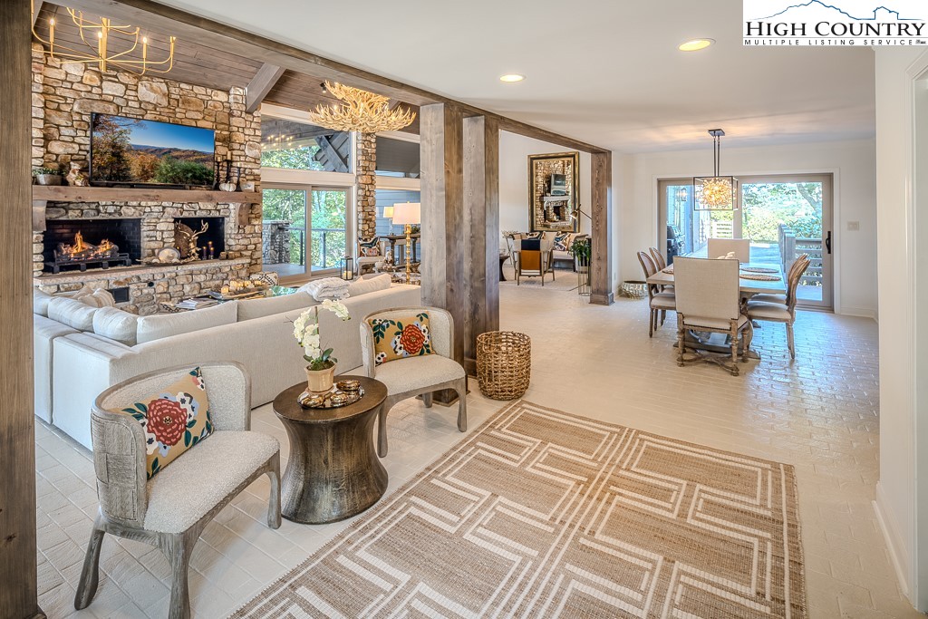 804 Crest Trail Linville, NC 28646 - Photo 6 of 40 a living room with furniture and a flat screen tv