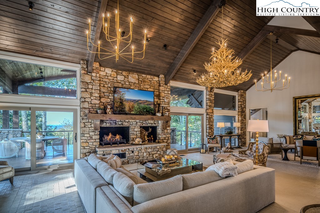804 Crest Trail Linville, NC 28646 - Photo 7 of 40 a living room with furniture and a fireplace