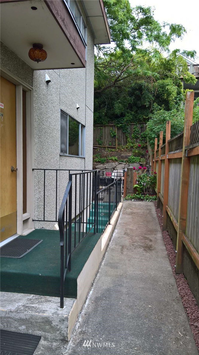 4215 Whitman Avenue North Seattle, WA 98103 - Photo 15 of 16 a view of a house with a small yard