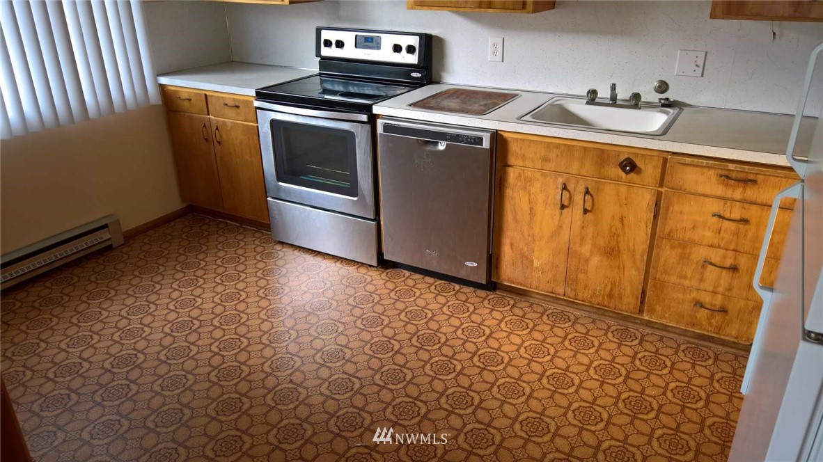 4215 Whitman Avenue North Seattle, WA 98103 - Photo 10 of 16 a utility room with dryer and washer