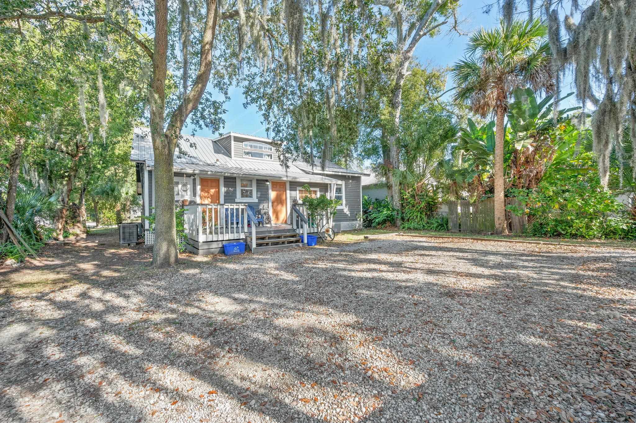 37 Rohde Avenue St. Augustine, FL 32084 - Photo 2 of 35 a view of street with plants and trees