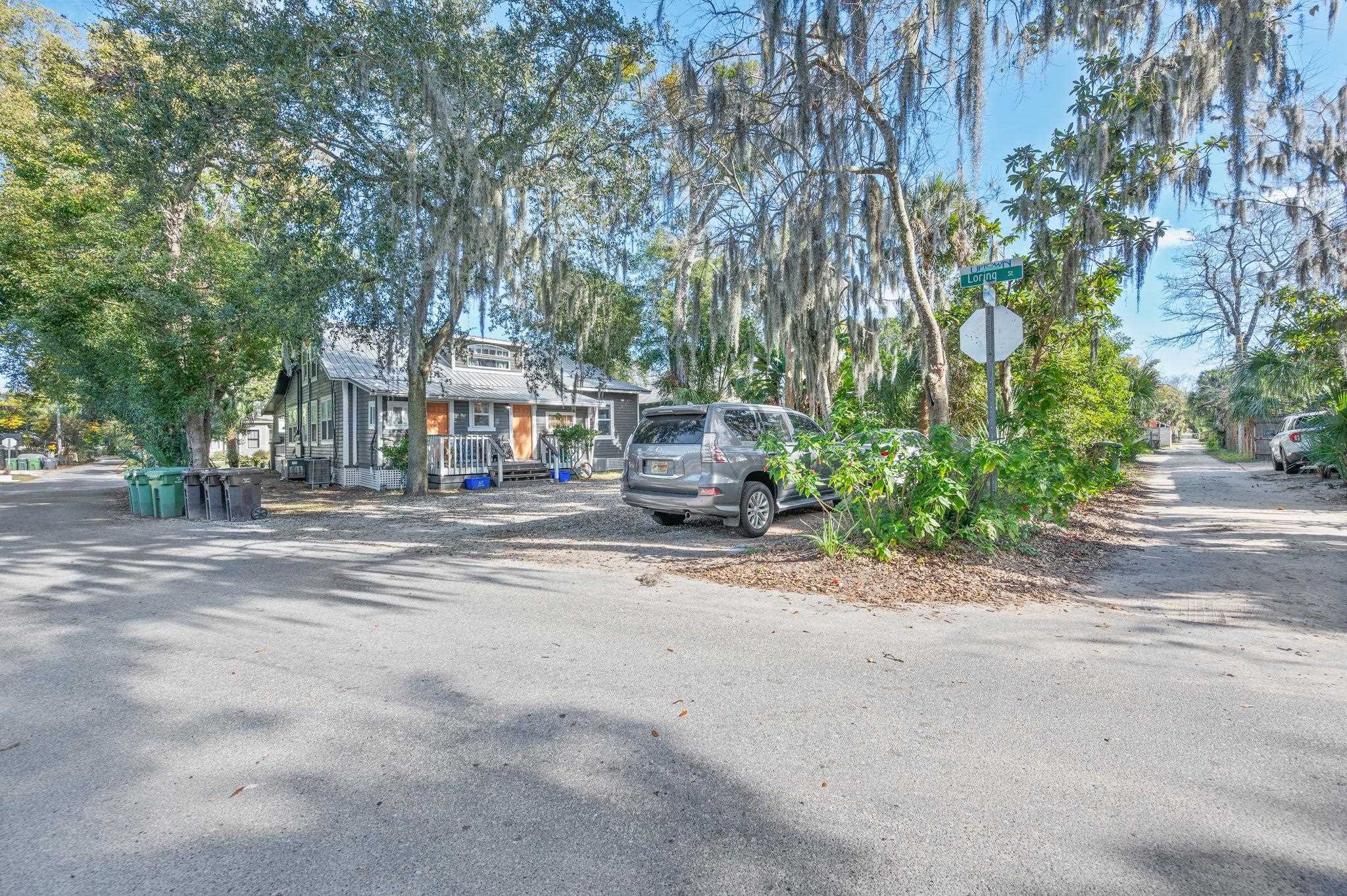 37 Rohde Avenue St. Augustine, FL 32084 - Photo 33 of 35 a front view of a house with a garden and tree