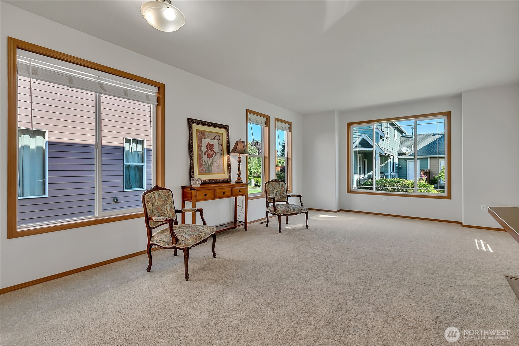 1720 Garfield Street, Unit 4 Enumclaw, WA 98022 - Photo 12 of 38 a living room with furniture and windows